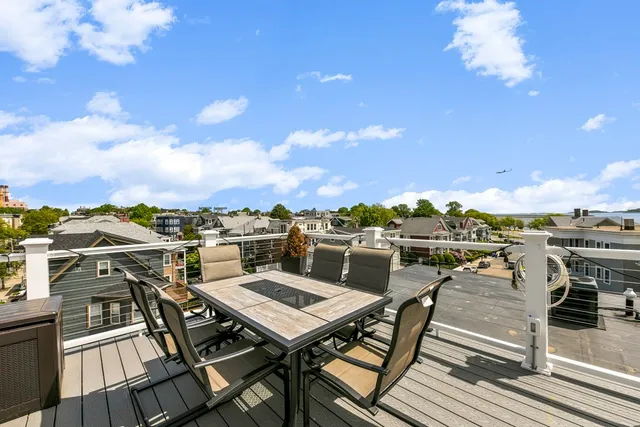 a view of a terrace with seating area