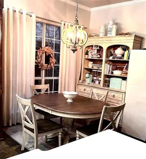 a table and chairs in a room