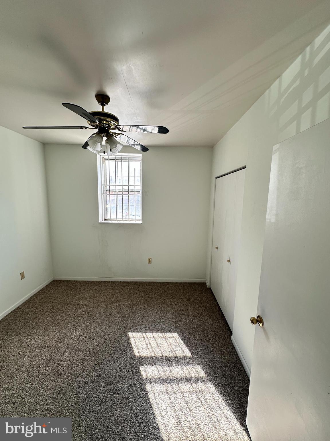 1243 South 8th Street Philadelphia, PA 19147 - Photo 17 of 18 a view of a livingroom with a ceiling fan and window