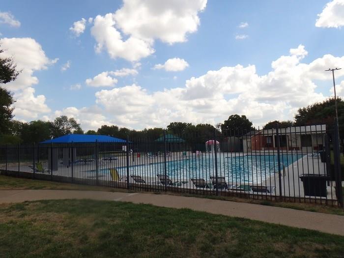 1903 Balsam Way Round Rock, TX 78665 - Photo 21 of 21 Securely fenced community pool with shaded lounge areas awaits summer enjoyment.