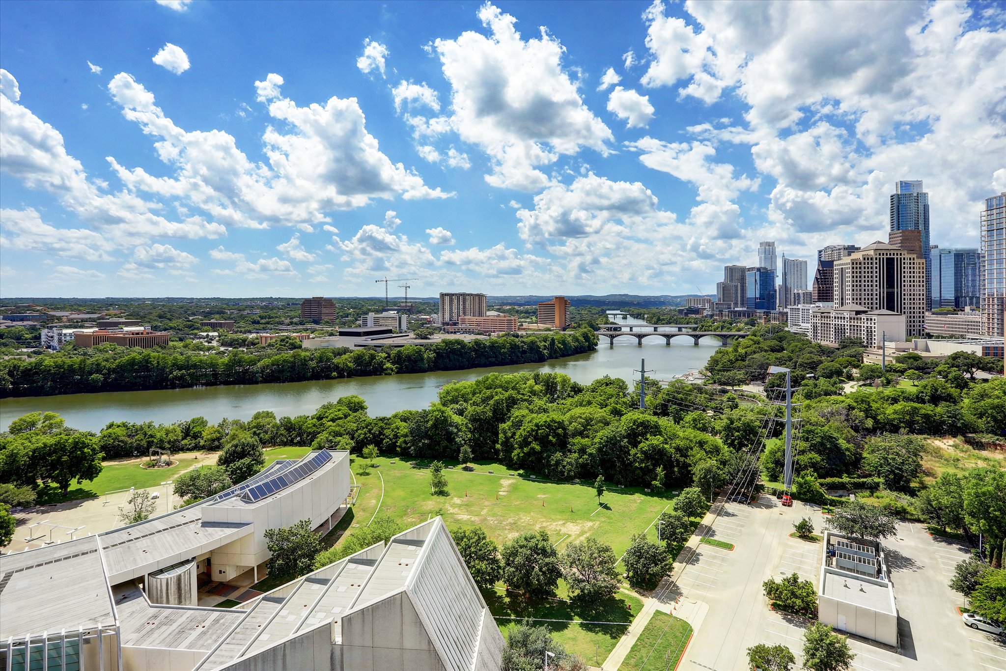 70 Rainey Street, Unit 1405 Austin, TX 78701 - Photo 11 of 31 a view of a lake with a yard
