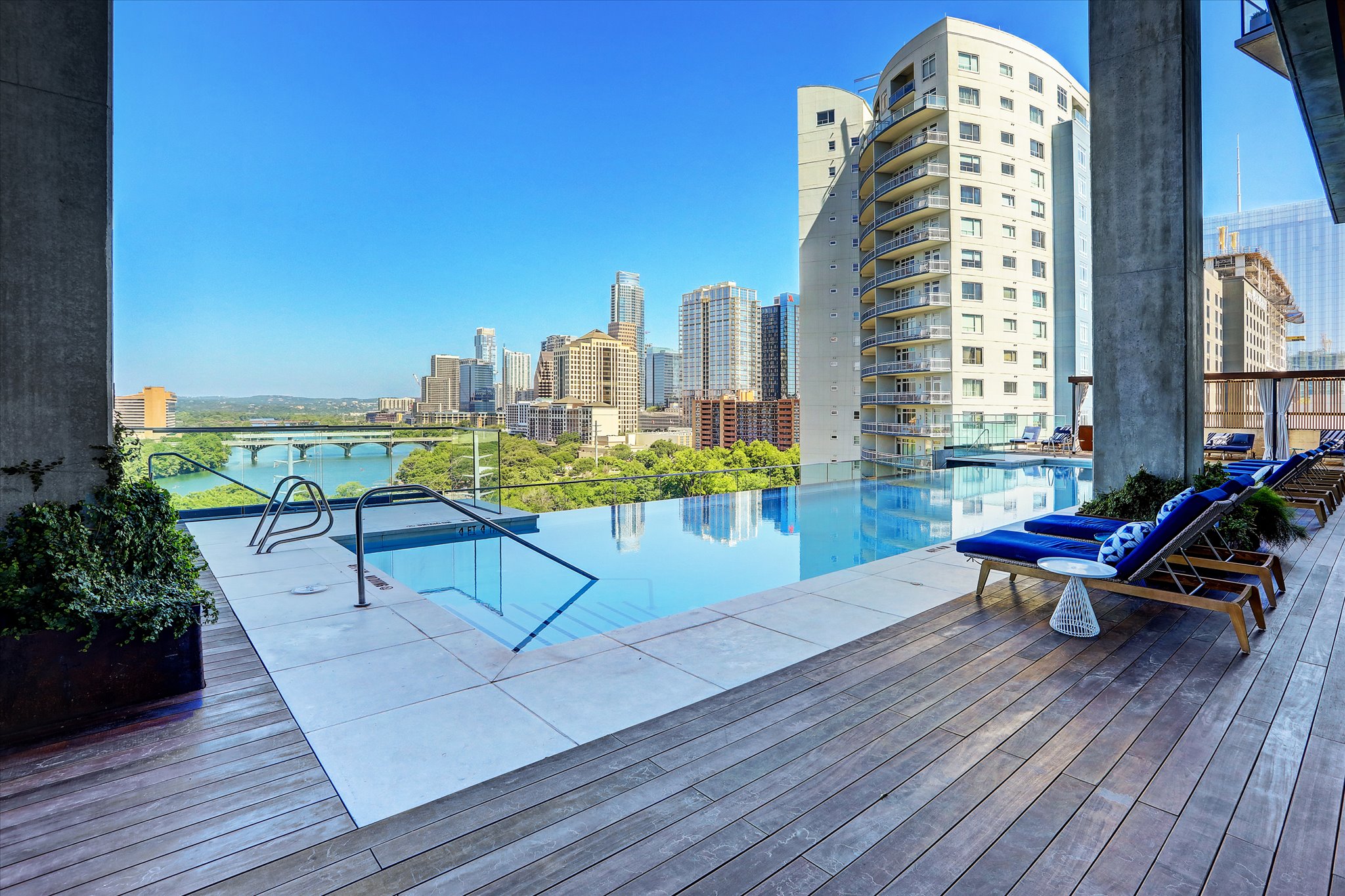 70 Rainey Street, Unit 1405 Austin, TX 78701 - Photo 12 of 31 a terrace with outdoor seating and wooden floor