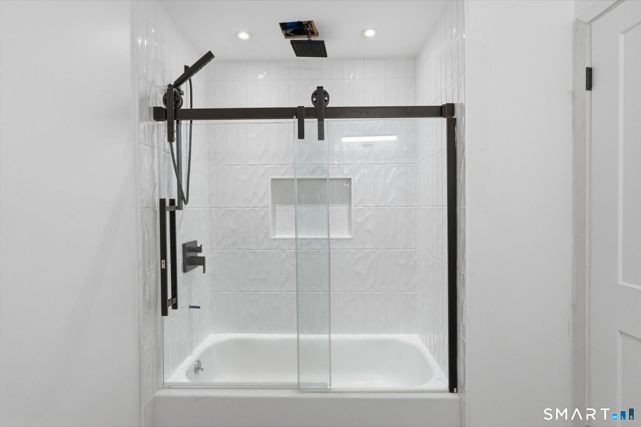 2 Yellow Orange Circle Middletown, CT 06457 - Photo 14 of 39 a bathroom with a shower and mirror