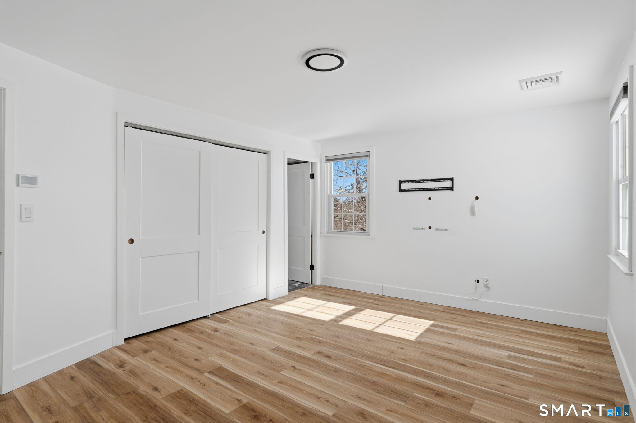 2 Yellow Orange Circle Middletown, CT 06457 - Photo 17 of 39 a view of empty room with wooden floor