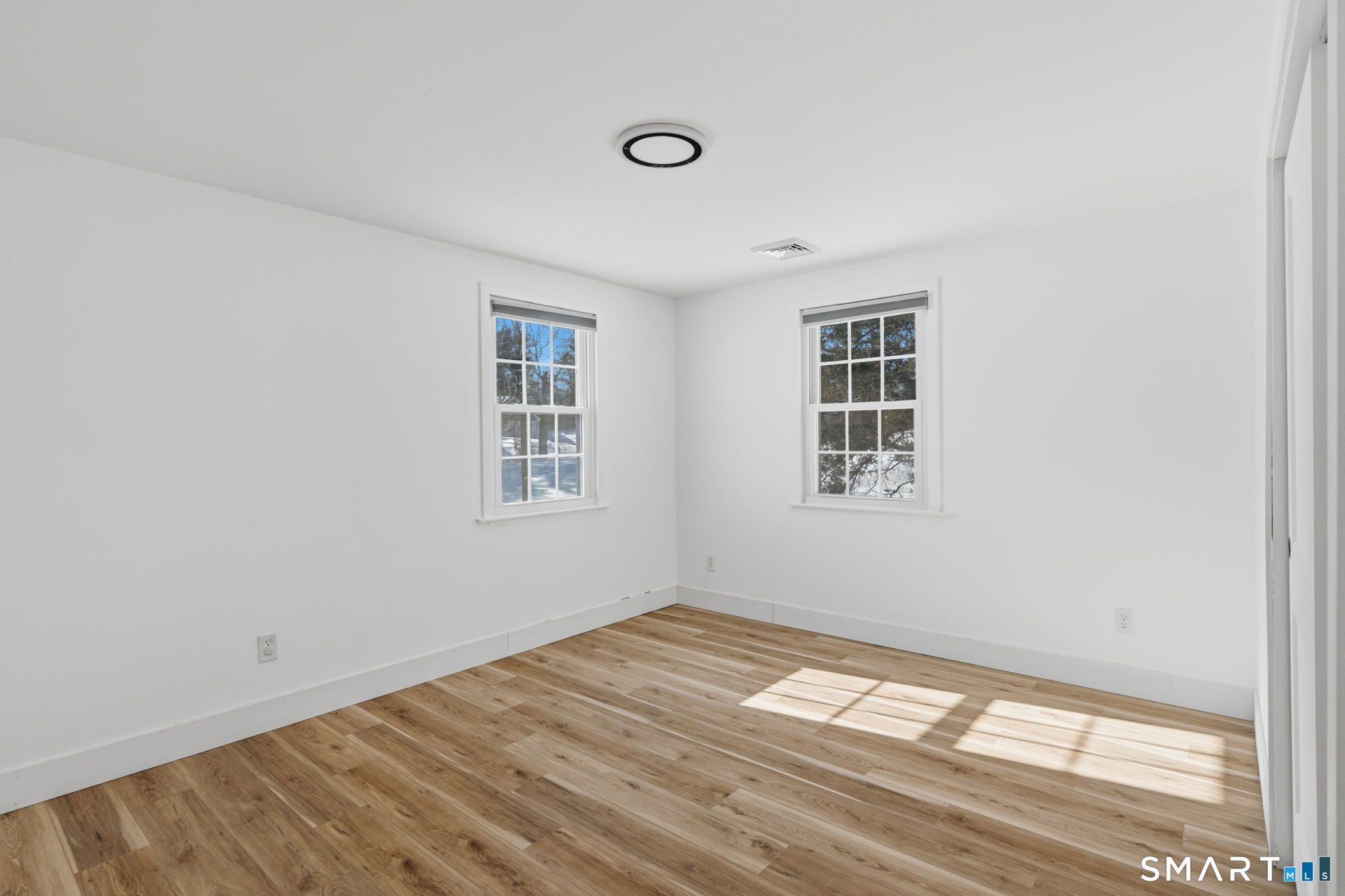 2 Yellow Orange Circle Middletown, CT 06457 - Photo 20 of 39 a view of empty room with wooden floor and fan