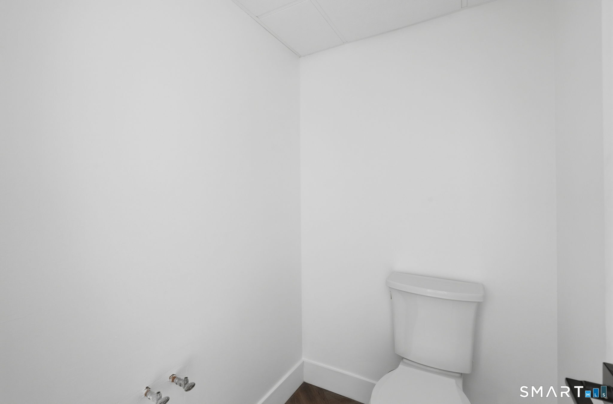 2 Yellow Orange Circle Middletown, CT 06457 - Photo 30 of 39 a white toilet sitting next to a white wall