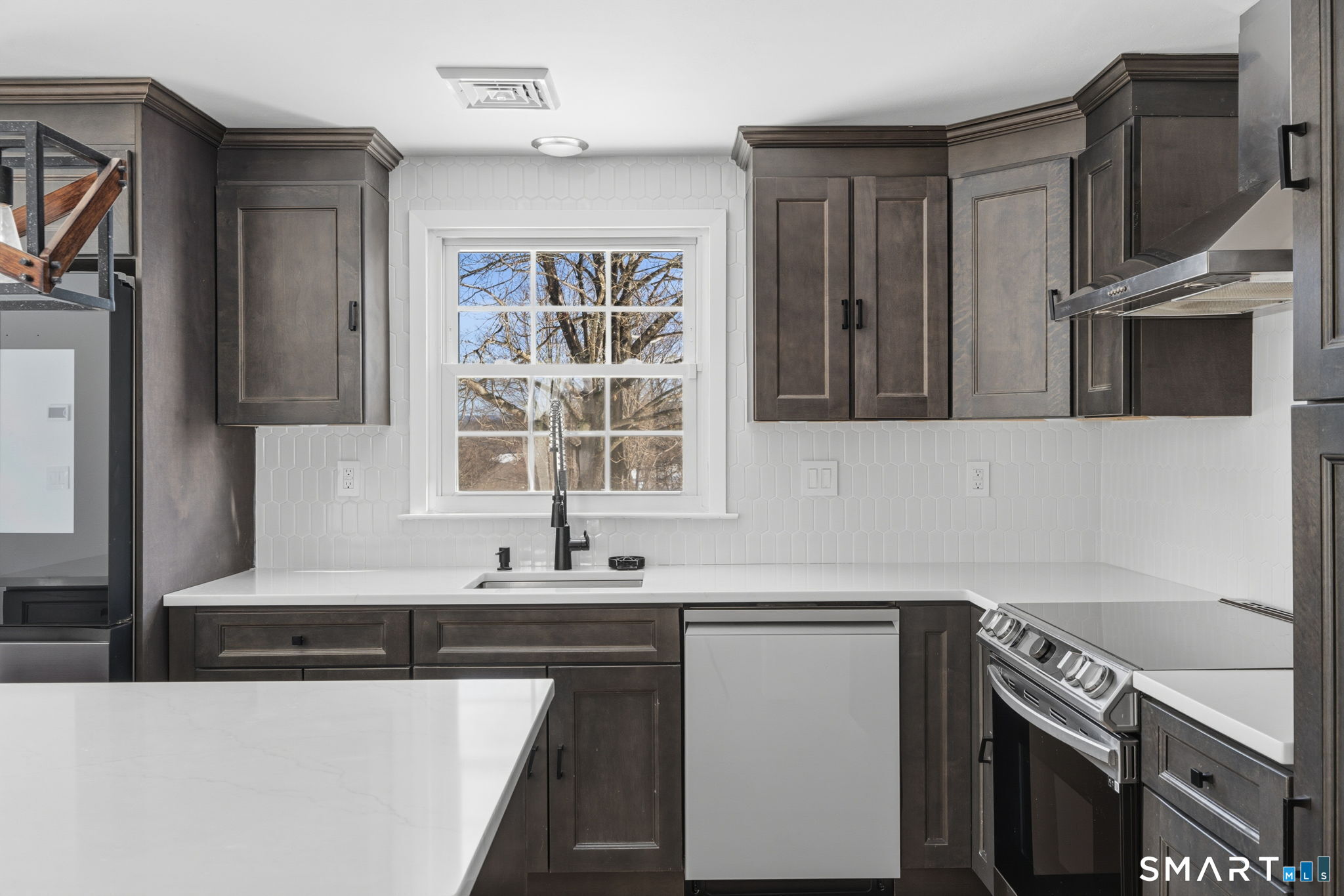 2 Yellow Orange Circle Middletown, CT 06457 - Photo 10 of 39 a kitchen with stainless steel appliances a sink stove and cabinets