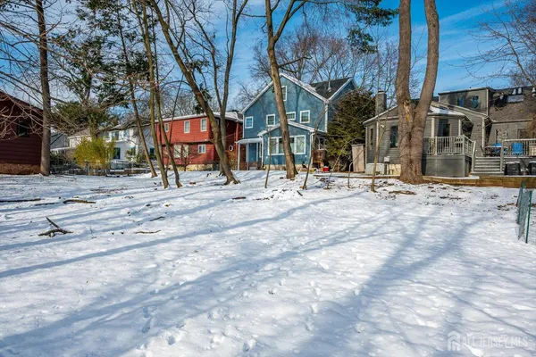 a view of a yard with trees