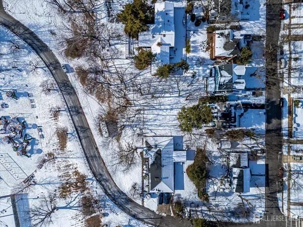 a view of road with a house