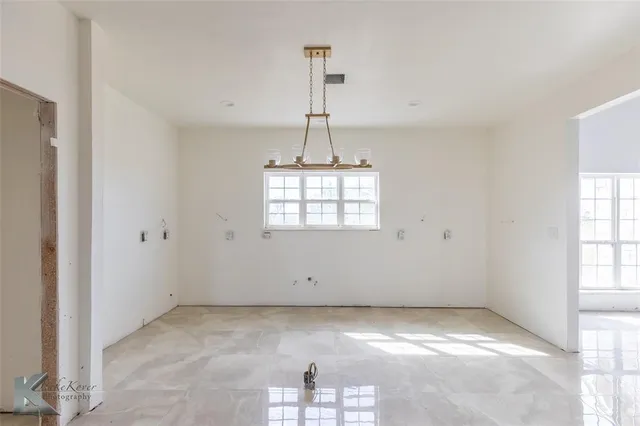 a view of a closet in the bathroom