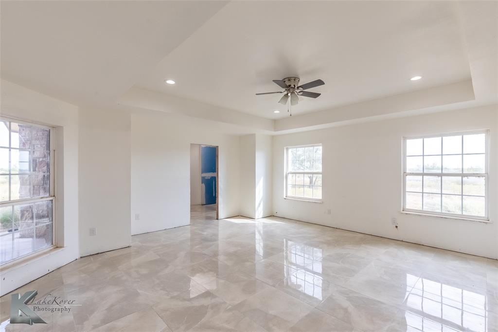 8773 West Lake Road Abilene, TX 79601 - Photo 19 of 40 a view of an empty room with a window