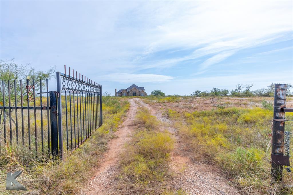 8773 West Lake Road Abilene, TX 79601 - Photo 2 of 40 a view of a city from a yard