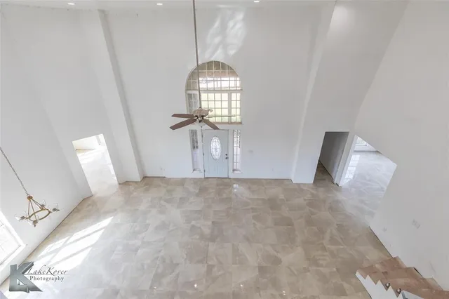 a view of an empty room and window