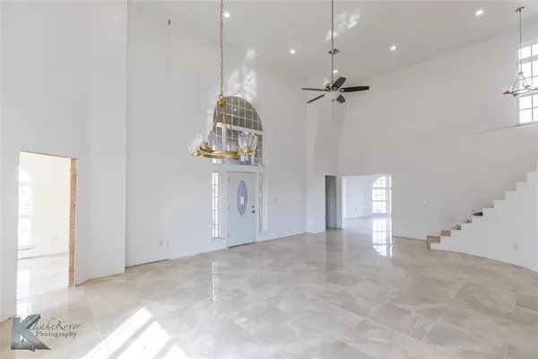 a view of an empty room and window