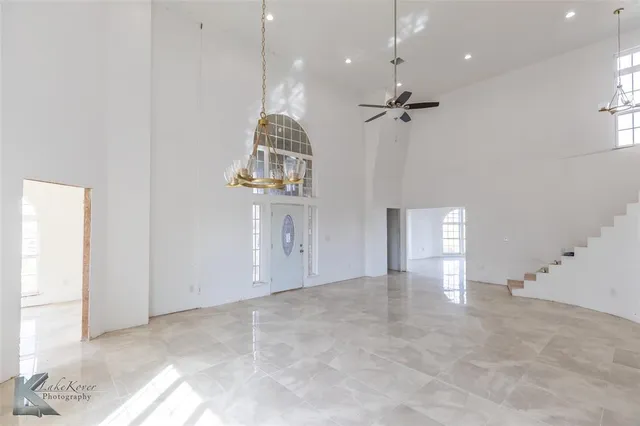 a view of an empty room and window