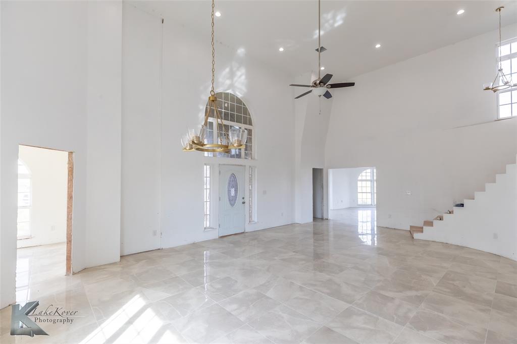 8773 West Lake Road Abilene, TX 79601 - Photo 8 of 40 a view of an empty room with a window