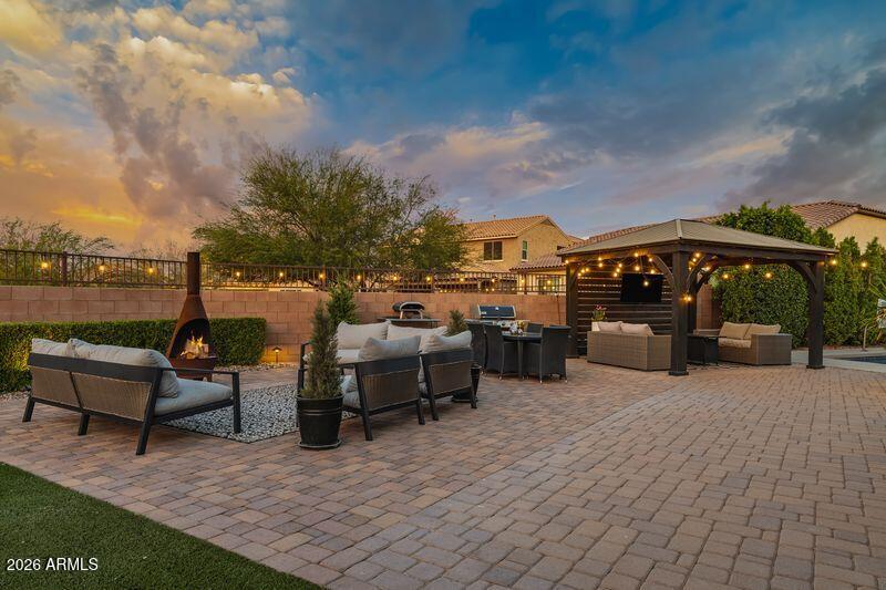 7871 South Stuart Avenue Gilbert, AZ 85298 - Photo 56 of 77 Backyard Twilight