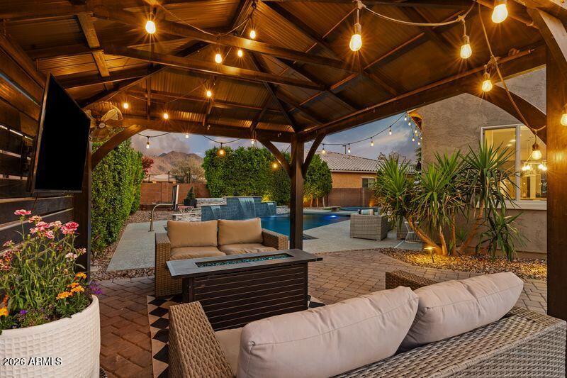 7871 South Stuart Avenue Gilbert, AZ 85298 - Photo 58 of 77 Backyard Twilight