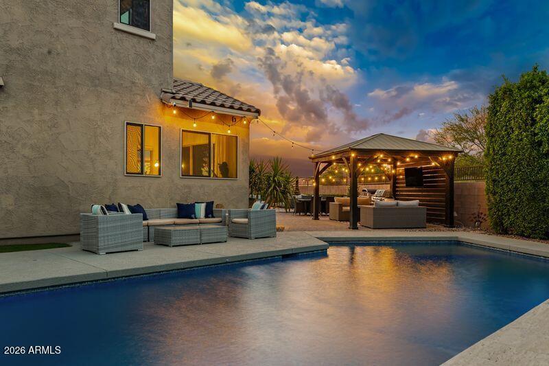 7871 South Stuart Avenue Gilbert, AZ 85298 - Photo 60 of 77 Backyard Twilight