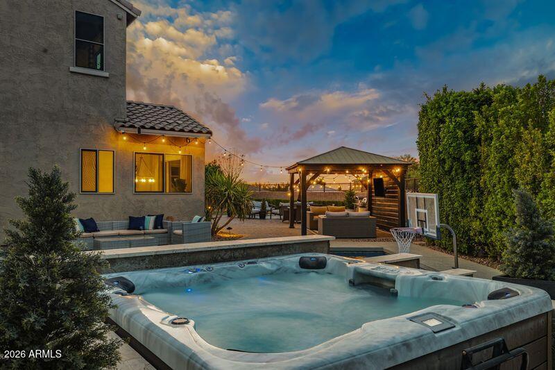 7871 South Stuart Avenue Gilbert, AZ 85298 - Photo 61 of 77 Backyard Twilight