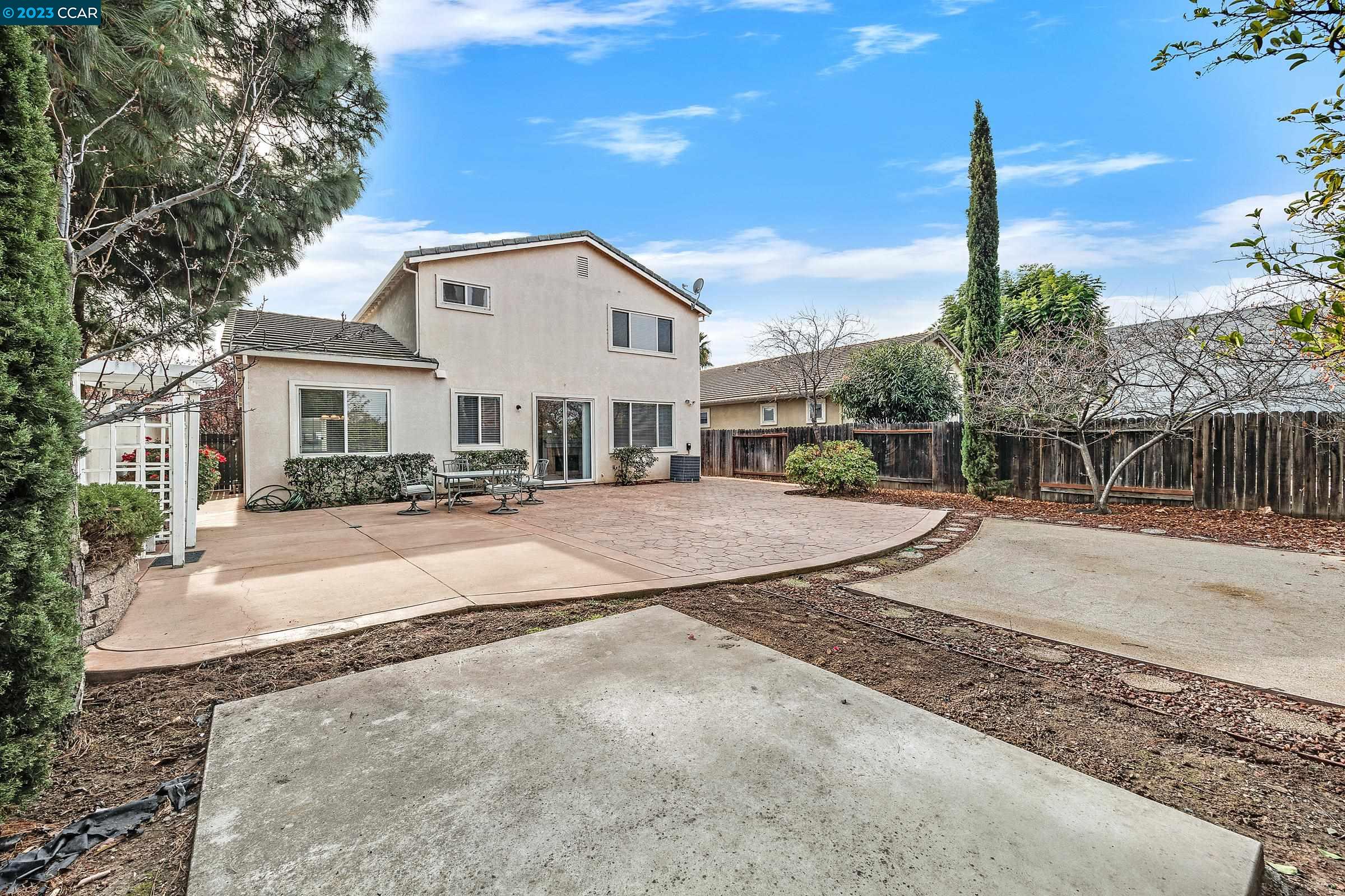 20 West 6th Street Pittsburg, CA 94565 - Photo 3 of 15 a view of a house with a yard