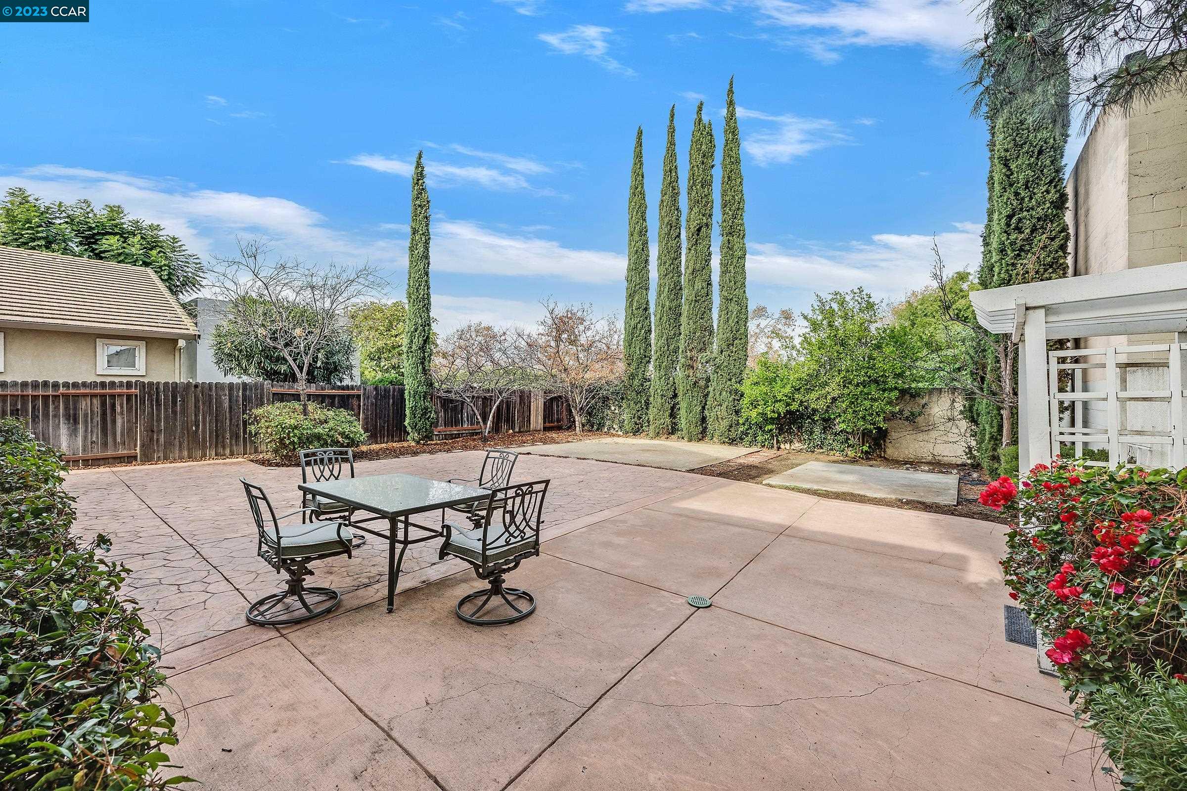 20 West 6th Street Pittsburg, CA 94565 - Photo 4 of 15 a view of a sitting area with furniture in front of house