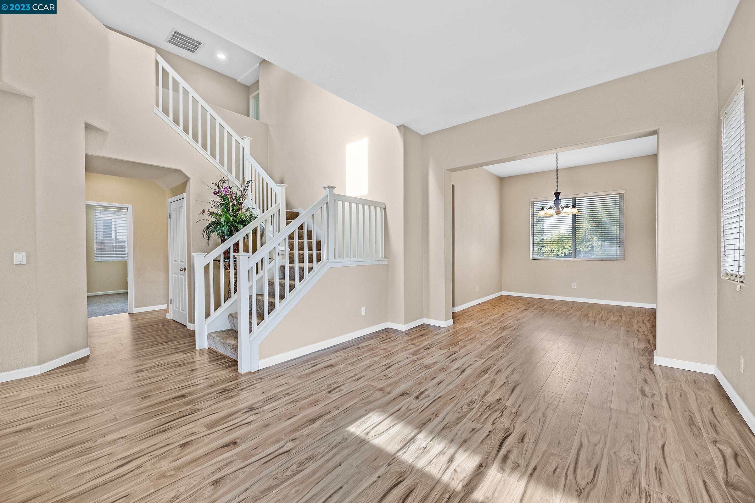 20 West 6th Street Pittsburg, CA 94565 - Photo 5 of 15 a view of entryway with wooden floor