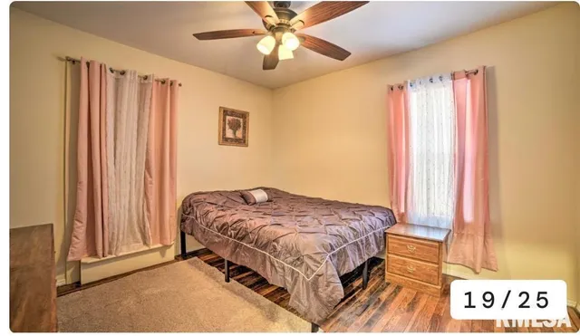 a bedroom with a bed and furniture