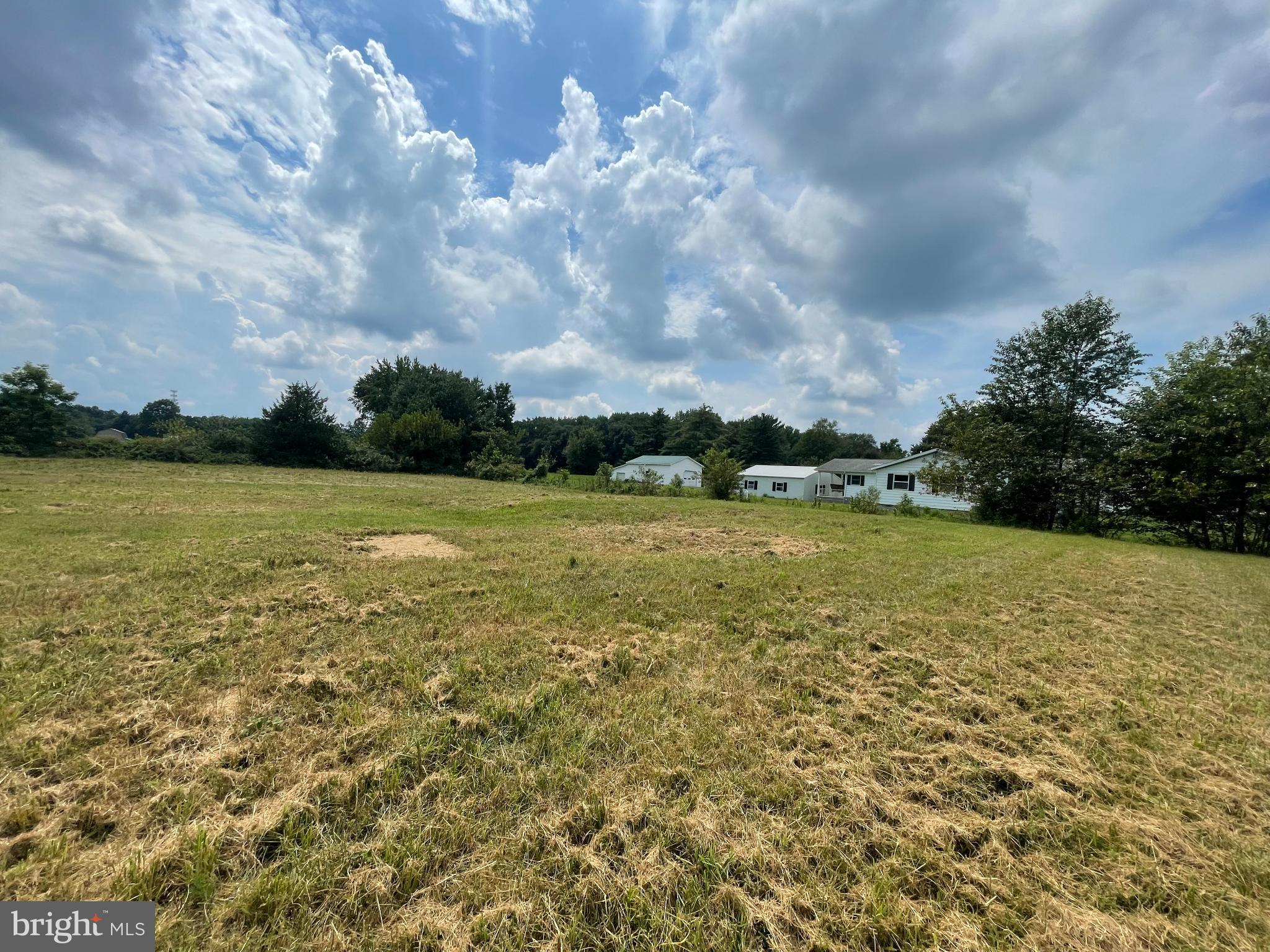 2736 Hartly Road, Unit 2736 Hartly, DE 19953 - Photo 6 of 6 a view of a lake with houses in the back