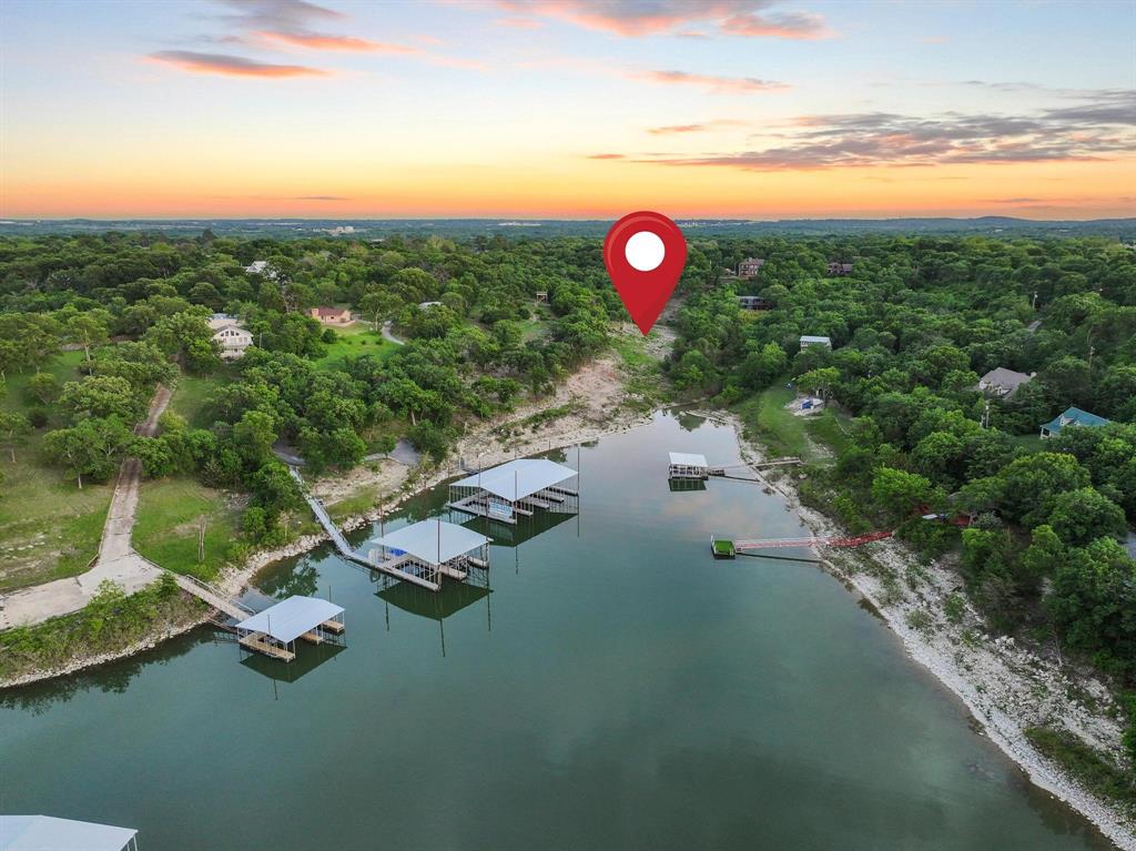 437 Neva Lane Denison, TX 75020 - Photo 2 of 40 a view of a lake with a outdoor space