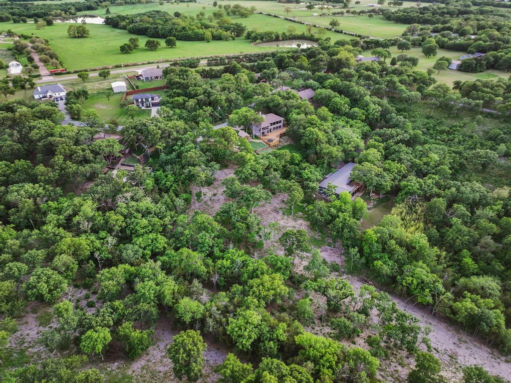 437 Neva Lane Denison, TX 75020 - Photo 37 of 40 an aerial view of residential houses with outdoor space and trees