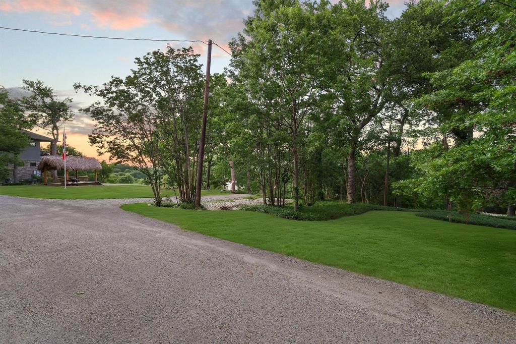437 Neva Lane Denison, TX 75020 - Photo 6 of 40 a view of a park with large trees