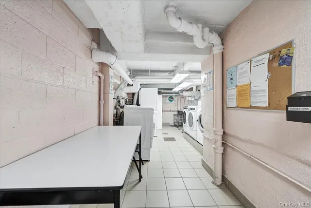 a kitchen with a refrigerator and a stove