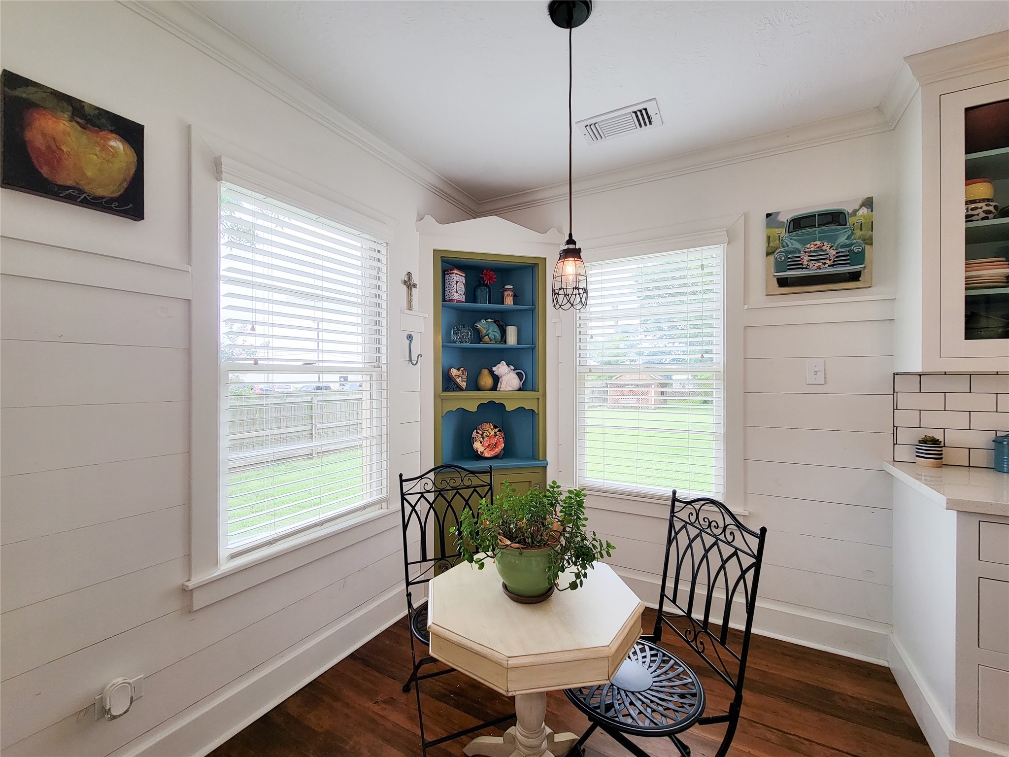 505 South Jackson Street Brenham, TX 77833 - Photo 11 of 25 a view of a dining room with furniture window and wooden floor