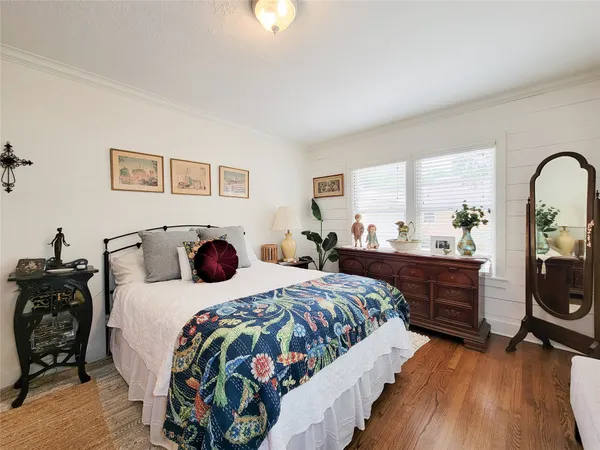 a bedroom with double bed and a closet