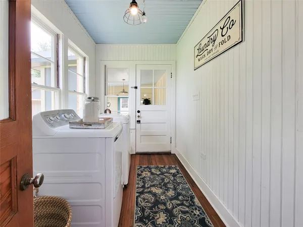 a bathroom with a sink a mirror and a shower