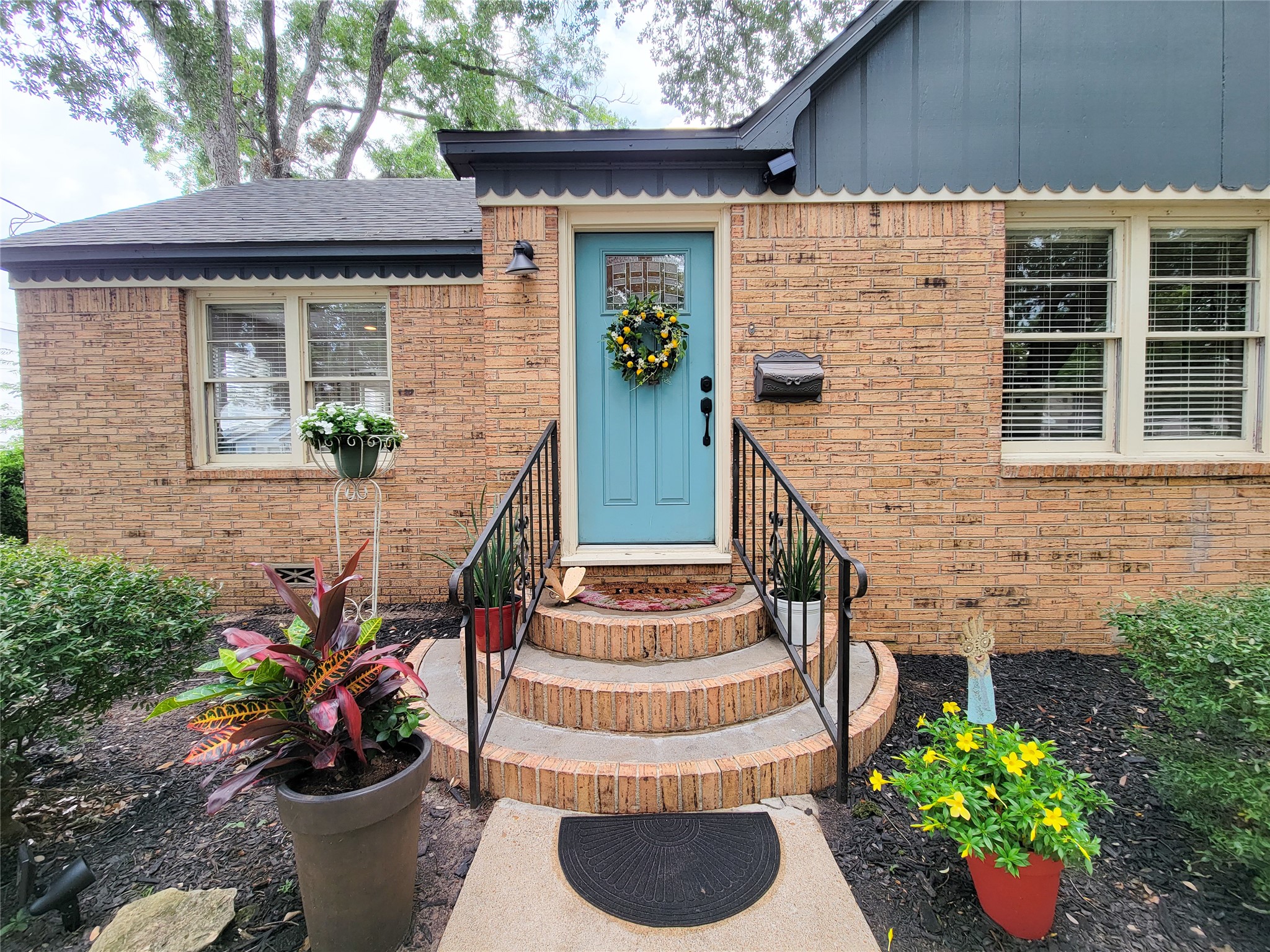 505 South Jackson Street Brenham, TX 77833 - Photo 2 of 25 a view of a house with potted plants