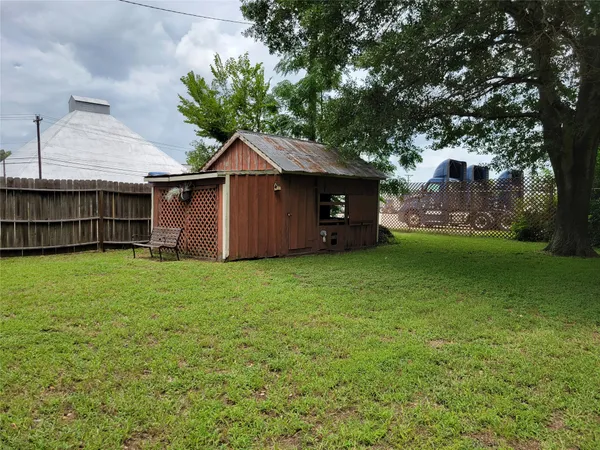 a view of a backyard with a garden