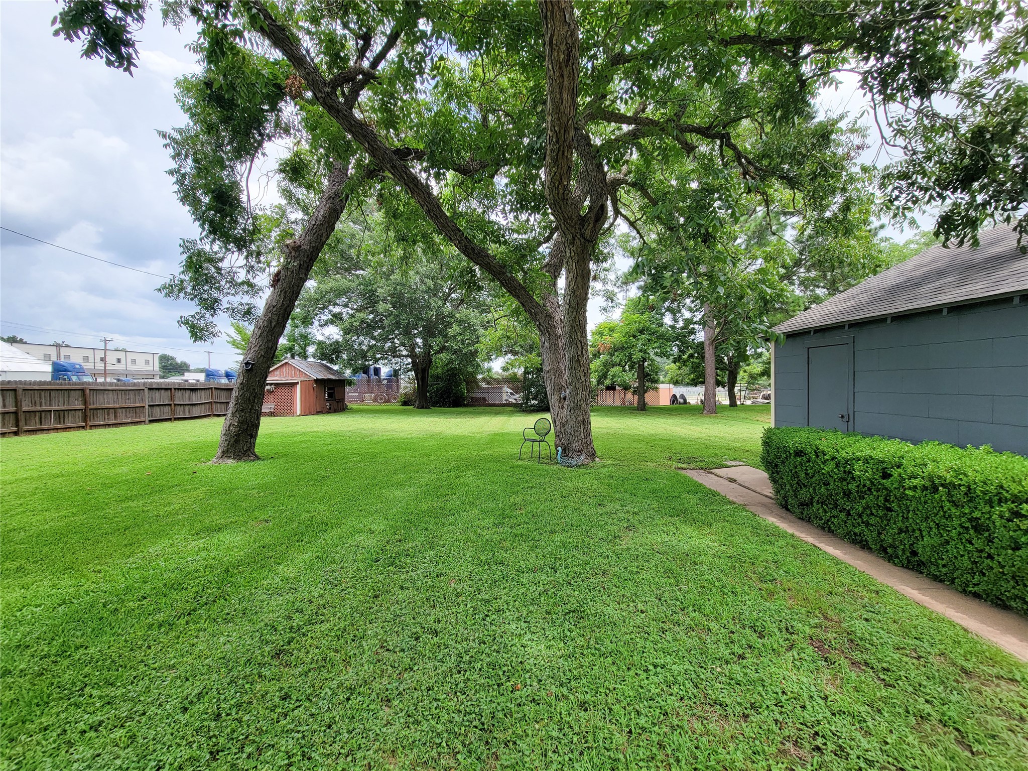 505 South Jackson Street Brenham, TX 77833 - Photo 24 of 25 a view of green field with trees in the background