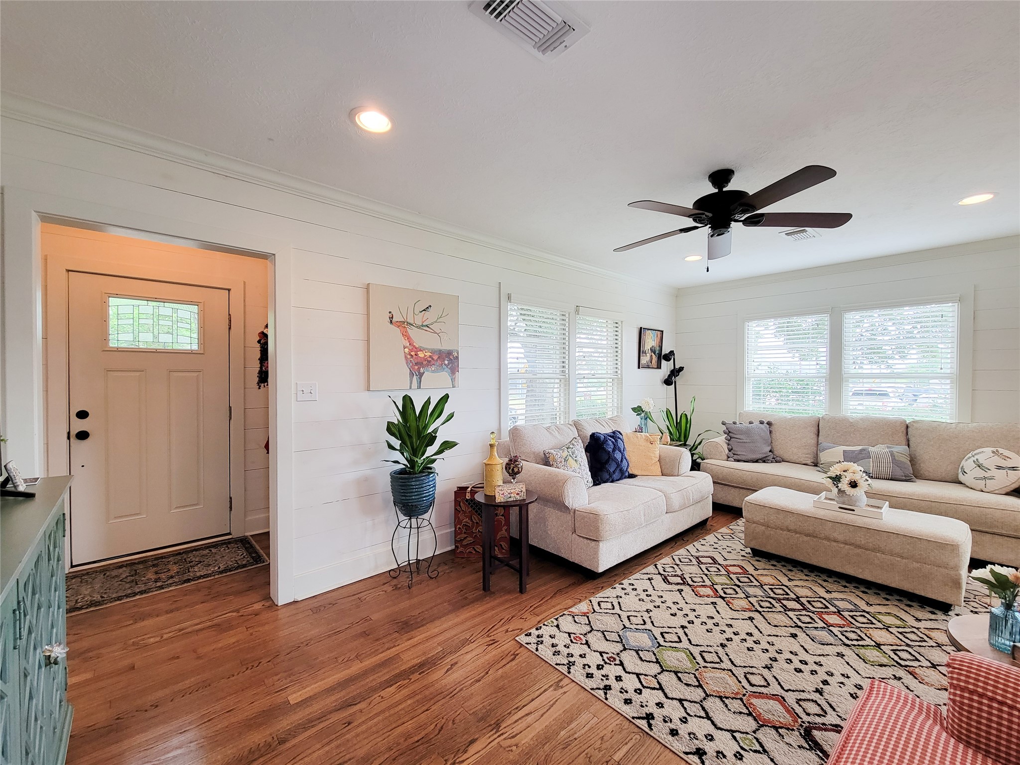 505 South Jackson Street Brenham, TX 77833 - Photo 3 of 25 a living room with furniture and a large window