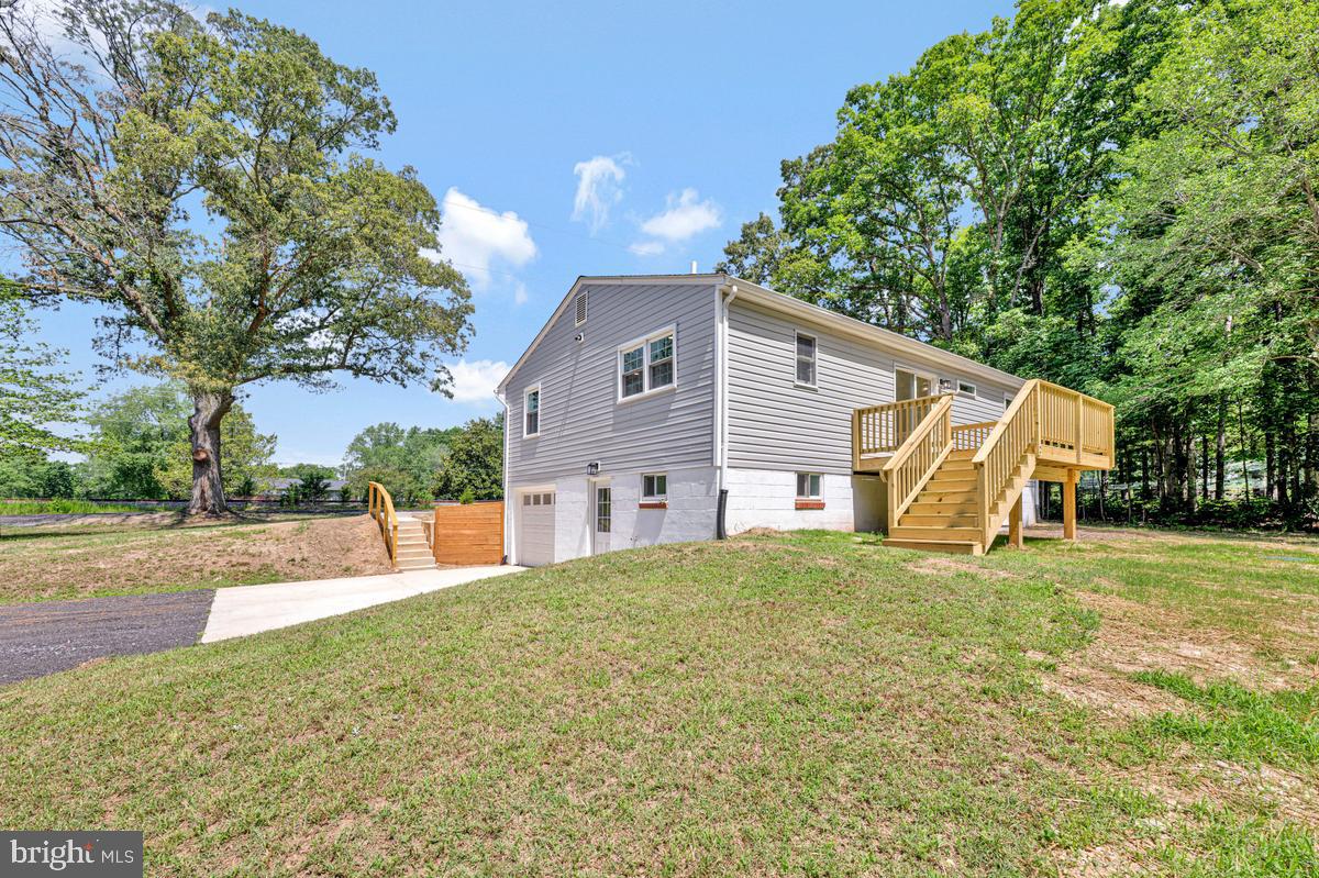 13304 Cherry Tree Crossing Road Brandywine, MD 20613 - Photo 2 of 32 Charming home nestled in nature's embrace.