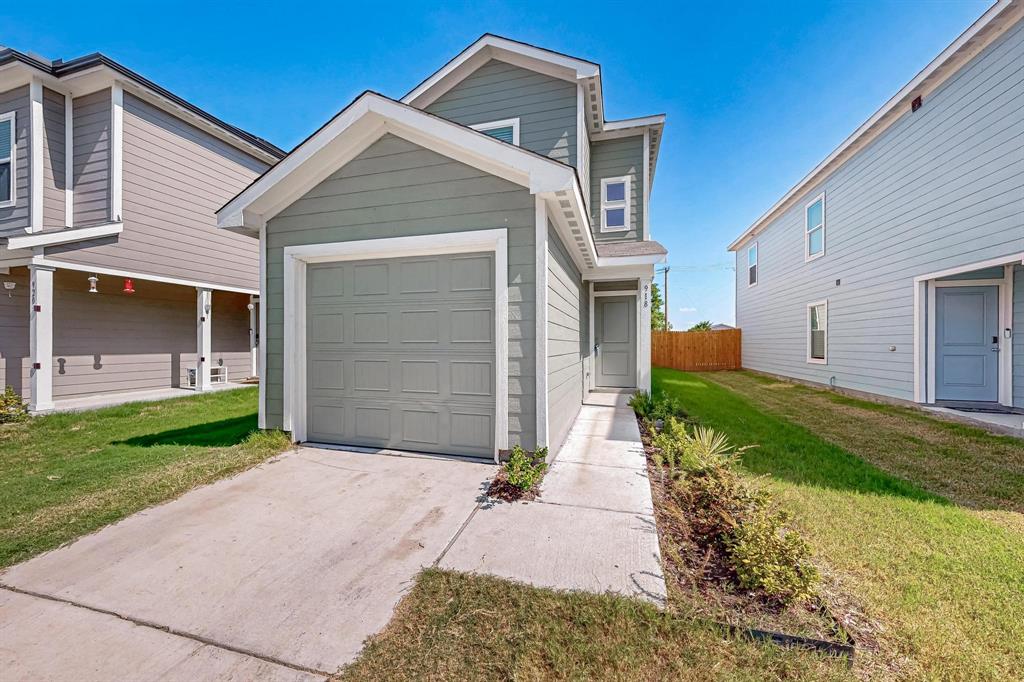 918 Grebe Drive Princeton, TX 75407 - Photo 1 of 29 a front view of a house with a yard and garage