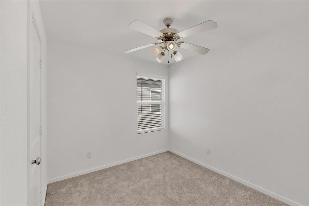 918 Grebe Drive Princeton, TX 75407 - Photo 11 of 29 an empty room with windows