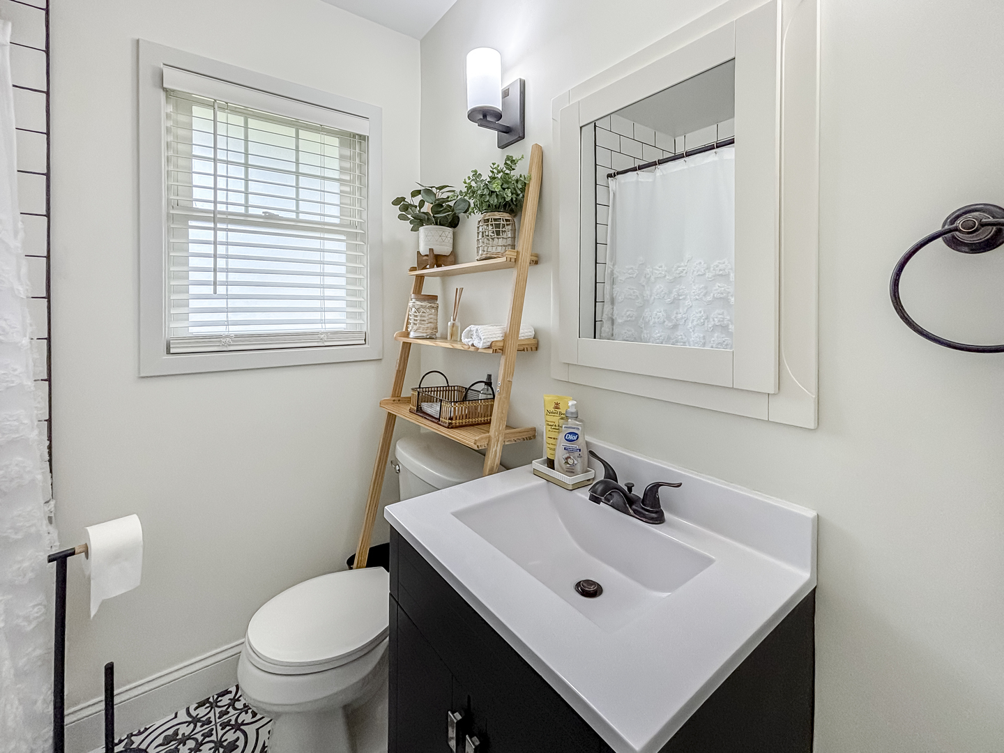 8538 45th Street Lyons, IL 60534 - Photo 12 of 29 a bathroom with a sink toilet and a mirror