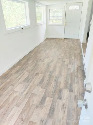 an empty room with windows