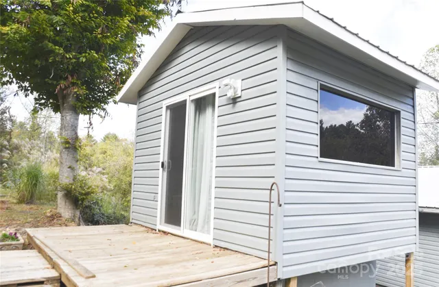 a view of a house with a garage