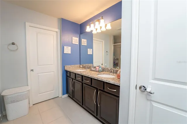 a bathroom with a toilet and a mirror