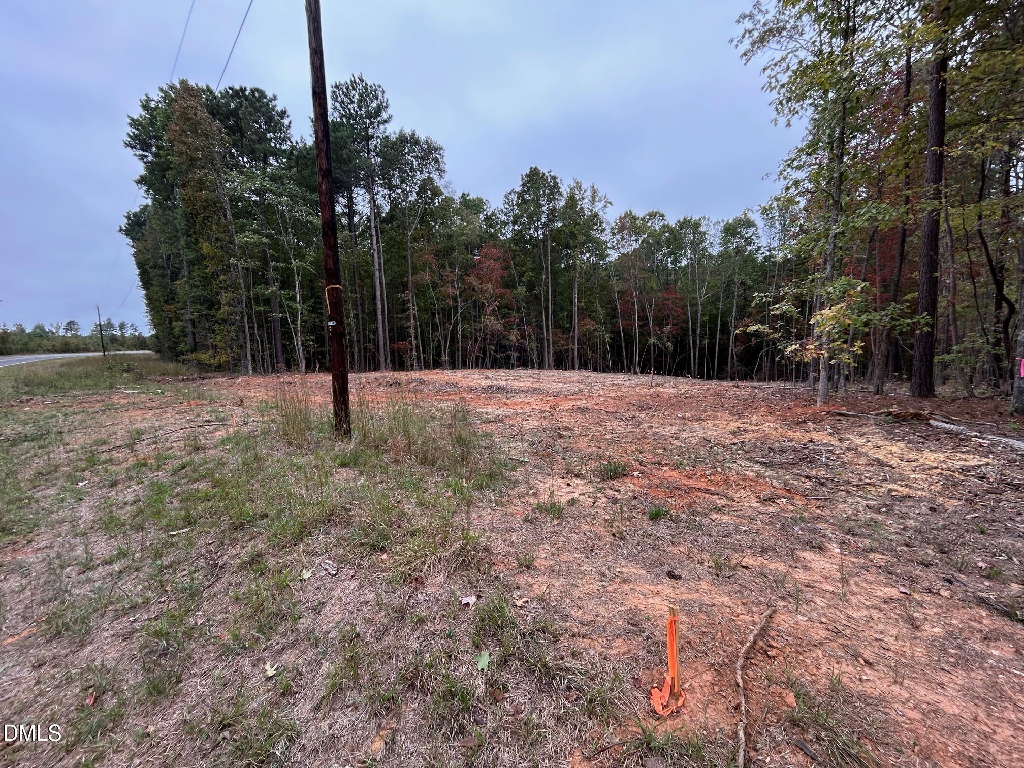 2077 Satterwhite Road Oxford, NC 27565 - Photo 2 of 8 a backyard of a house with lots of green space