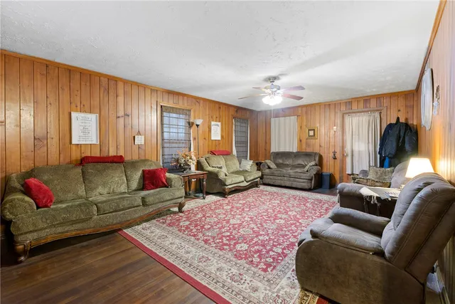 a bathroom with a sink a mirror and a shower