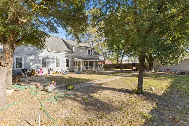 an aerial view of residential building with ocean view